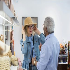 a cowboy puts his hat on a girl