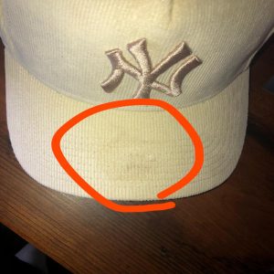 how to clean a white hat